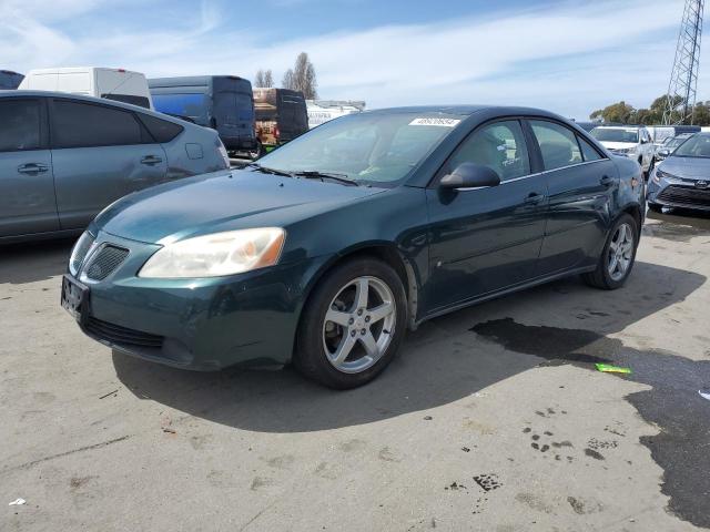 1G2ZG58N474236092 - 2007 PONTIAC G6 BASE GREEN photo 1