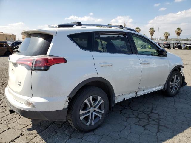 JTMBFREV9JJ250669 - 2018 TOYOTA RAV4 LE WHITE photo 3