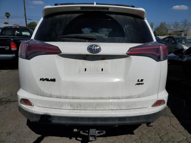 JTMBFREV9JJ250669 - 2018 TOYOTA RAV4 LE WHITE photo 6