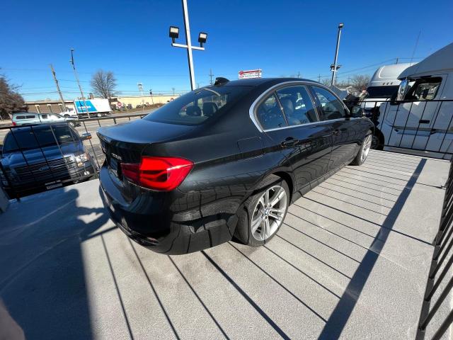 WBA8D9C52JEM33923 - 2018 BMW 330 XI Czarny zdjęcie 4