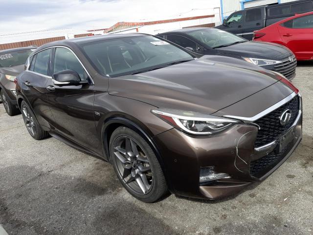 SJKCH5CP8JA040735 - 2018 INFINITI QX30 BASE Braun Foto 4