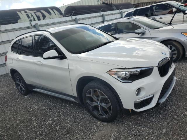 WBXHU7C32H5H37923 - 2017 BMW X1 SDRIVE28I WHITE photo 4