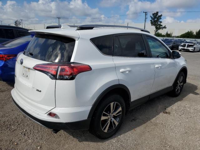 2T3WFREV4JW519115 - 2018 TOYOTA RAV4 ADVENTURE WHITE photo 4