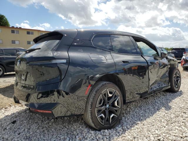 WB523CF04RCP31644 - 2024 BMW IX XDRIVE50 Qara foto 3