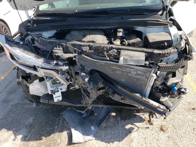 KNDNE5H31P6214683 - 2023 KIA CARNIVAL SX WHITE photo 12