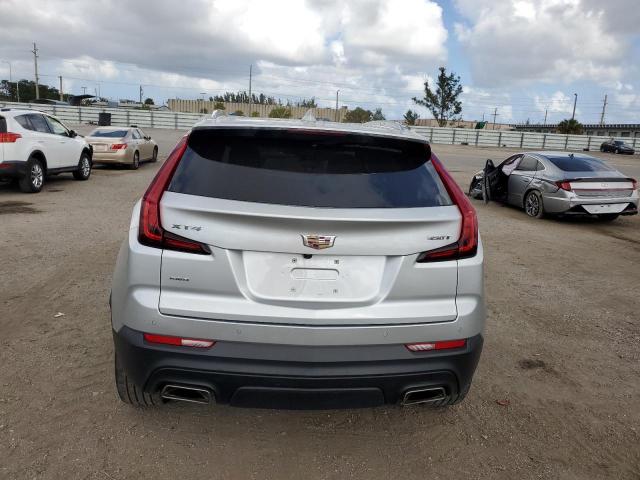 1GYFZBR4XMF070765 - 2021 CADILLAC XT4 LUXURY GRAY photo 6