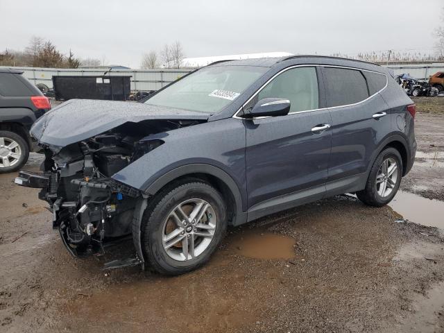 5NMZUDLB8HH029791 - 2017 HYUNDAI SANTA FE S BLUE photo 1