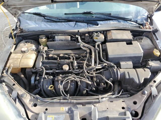 1FAFP38Z64W177963 - 2004 FORD FOCUS ZTS SILVER photo 11