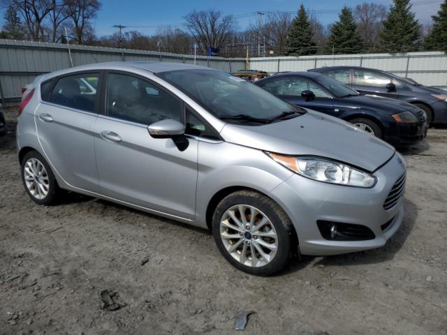 3FADP4FJ8HM164115 - 2017 FORD FIESTA TITANIUM SILVER photo 4