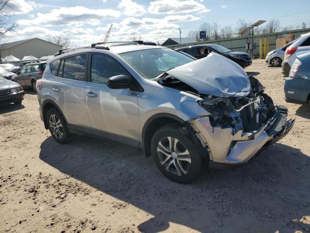 2T3BFREV2JW852752 - 2018 TOYOTA RAV4 LE SILVER photo 4