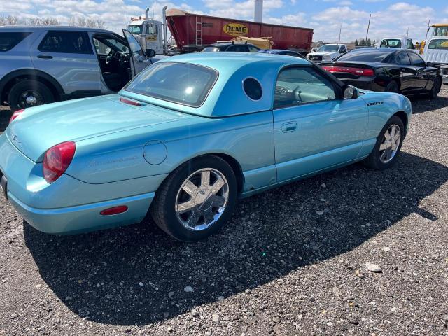 1FAHP60A72Y128031 - 2002 FORD THUNDERBIR TEAL photo 4