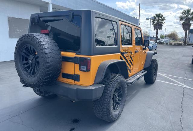 1C4BJWDG6DL557323 - 2013 JEEP WRANGLER U SPORT YELLOW photo 4