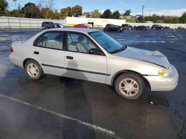 1Y1SK52842Z404089 - 2002 CHEVROLET GEO PRIZM BASE SILVER photo 4