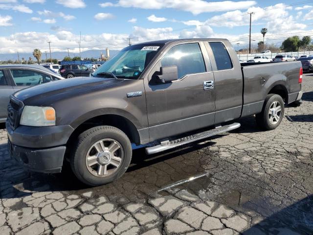 1FTPX12587KC86901 - 2007 FORD F150 BROWN photo 1