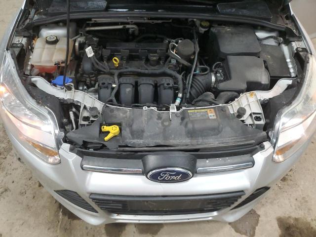 1FAHP3F22CL409943 - 2012 FORD FOCUS SE SILVER photo 11