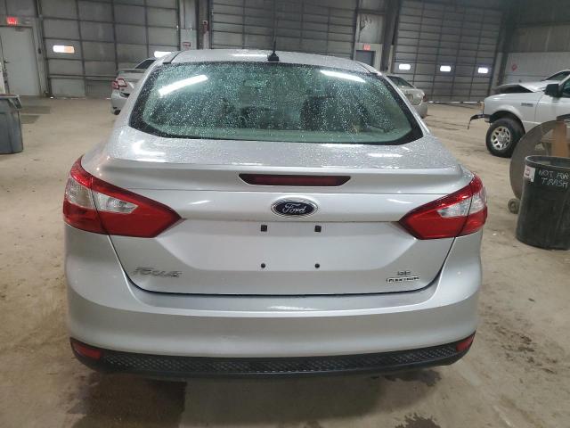 1FAHP3F22CL409943 - 2012 FORD FOCUS SE SILVER photo 6