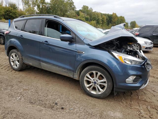 1FMCU0GD8JUA83452 - 2018 FORD ESCAPE SE BLUE photo 4