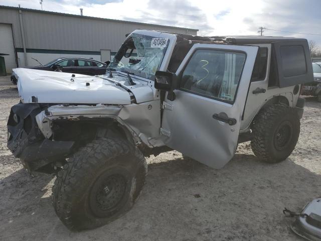 1J4BA5H17AL114099 - 2010 JEEP WRANGLER U SAHARA SILVER photo 1