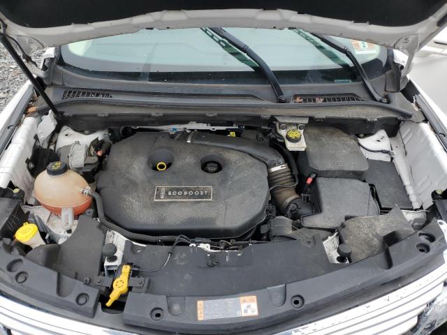 5LMTJ3DH4HUL32354 - 2017 LINCOLN MKC RESERVE თეთრი ფოტო 12