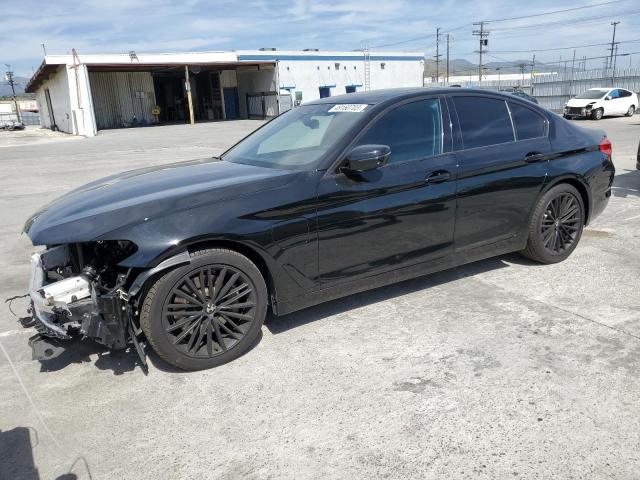 WBAJA9C58KB392498 - 2019 BMW 530E BLACK photo 1