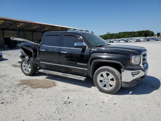 3GTU2NEC4HG330811 - 2017 GMC SIERRA K1500 SLT BLACK photo 4