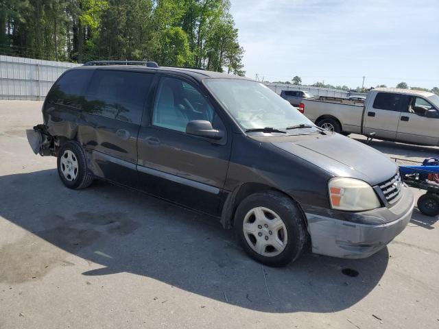 2FMDA51696BA39509 - 2006 FORD FREESTAR SE BLACK photo 4