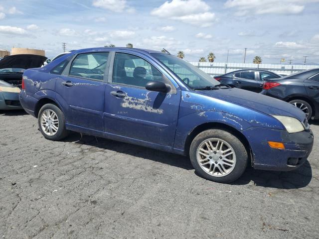 1FAHP34N36W256389 - 2006 FORD FOCUS ZX4 BLUE photo 4