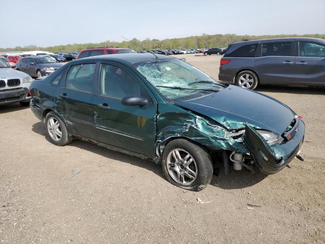 1FAFP33P5YW236433 - 2000 FORD FOCUS LX GREEN photo 4