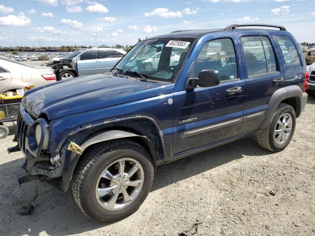 1J4GL48K94W303990 - 2004 JEEP LIBERTY SPORT BLUE photo 1