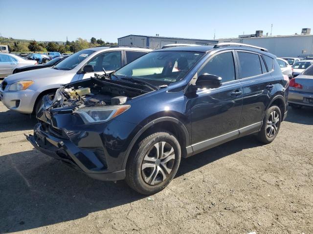 JTMZFREV5JJ197158 - 2018 TOYOTA RAV4 LE BLUE photo 1