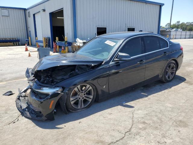 WBA8E1C31HA159323 - 2017 BMW 330E BLACK photo 1