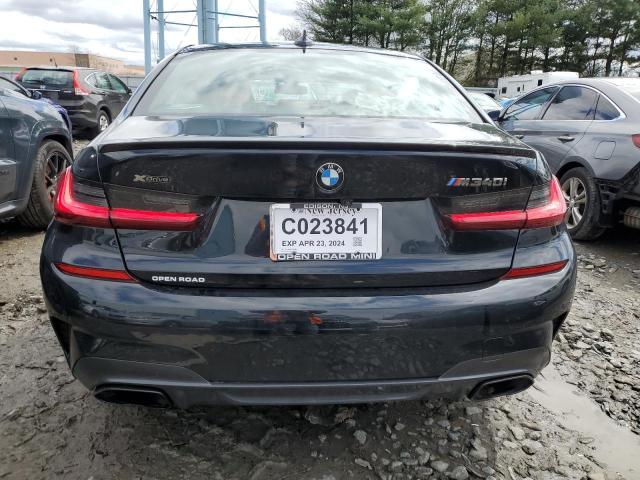 3MW5U9J07N8C32652 - 2022 BMW M340XI BLACK photo 6
