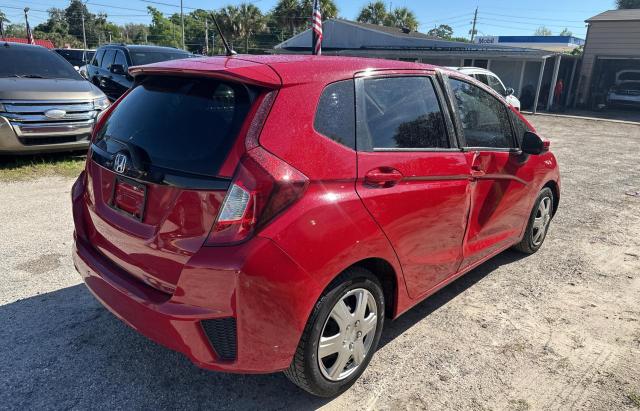 JHMGK5H56GX010697 - 2016 HONDA FIT LX RED photo 4