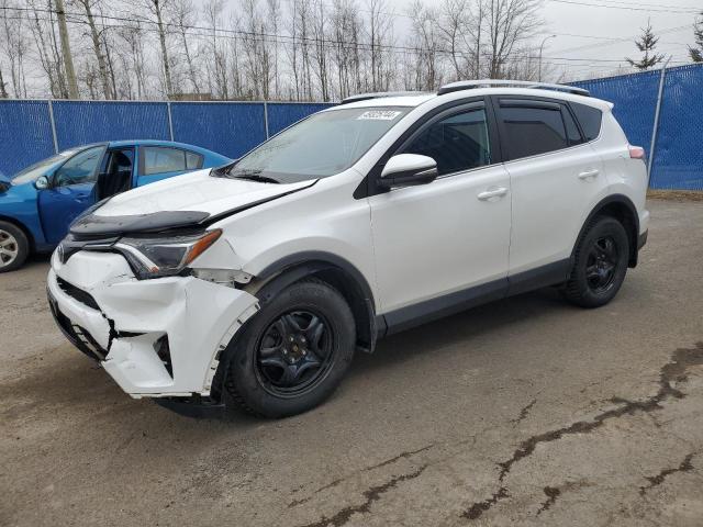 2T3RFREV7GW425221 - 2016 TOYOTA RAV4 XLE WHITE photo 1