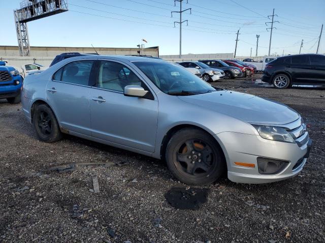 3FAHP0HA2BR231812 - 2011 FORD FUSION SE GRAY photo 4