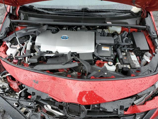 JTDKAMFPXM3174793 - 2021 TOYOTA PRIUS PRIM LE RED photo 11