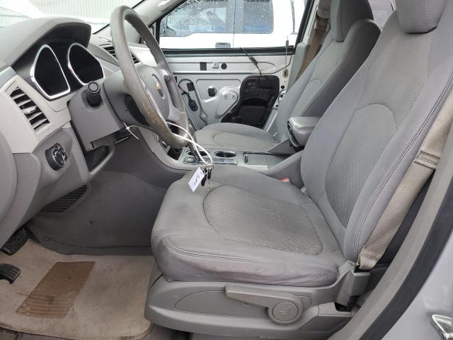 1GNKREED6CJ275546 - 2012 CHEVROLET TRAVERSE LS SILVER photo 7