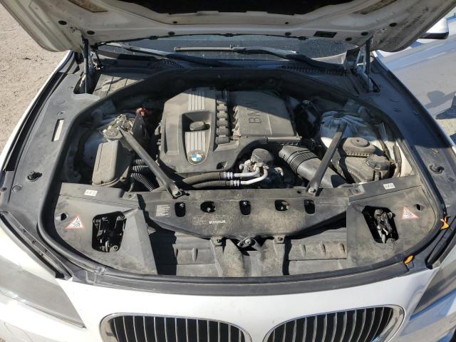 WBAKA4C5XCC613456 - 2012 BMW 740 I WHITE photo 11