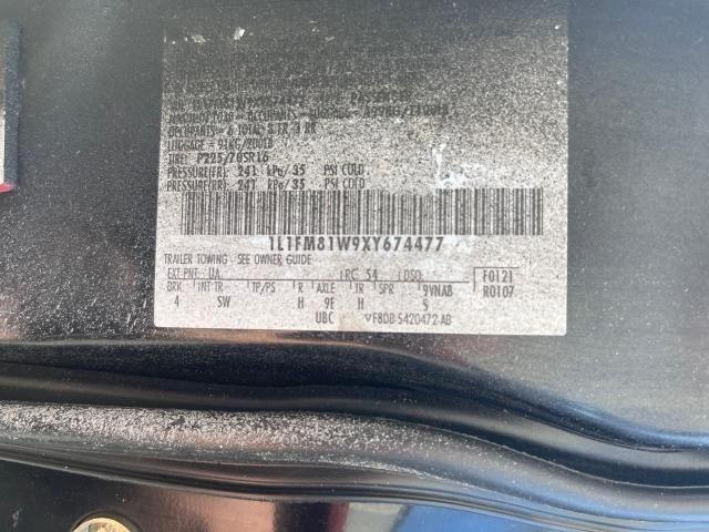 1L1FM81W9XY674477 - 1999 LINCOLN TOWN CAR EXECUTIVE BLACK photo 10