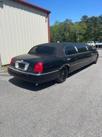 1L1FM81W9XY674477 - 1999 LINCOLN TOWN CAR EXECUTIVE BLACK photo 4