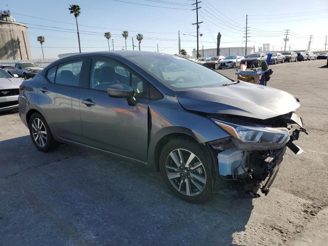 3N1CN8EV4LL879899 - 2020 NISSAN VERSA SV SILVER photo 4