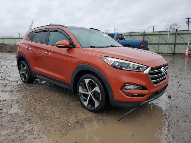 KM8J3CA27GU070414 - 2016 HYUNDAI TUCSON LIMITED ORANGE photo 4