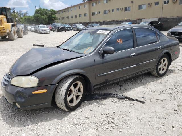 JN1CA31D5YT719853 - 2000 NISSAN MAXIMA GLE GRAY photo 1