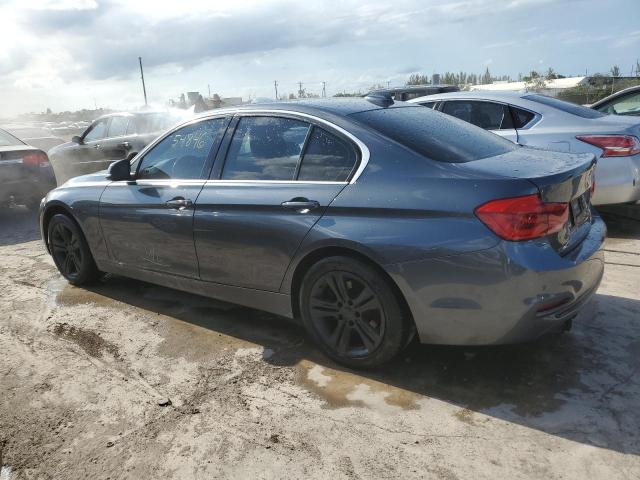 WBA8B9G51JNU98293 - 2018 BMW 330 I GRAY photo 2