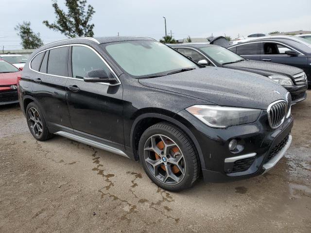 WBXHT3C57K5L89635 - 2019 BMW X1 XDRIVE28I BLACK photo 4