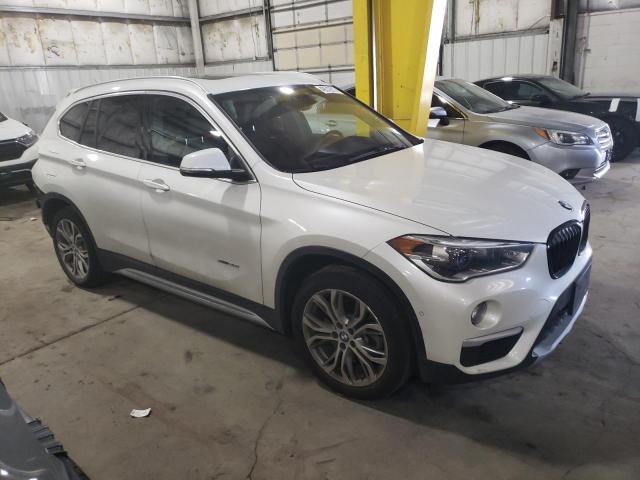 WBXHT3C38H5F72147 - 2017 BMW X1 XDRIVE28I WHITE photo 4