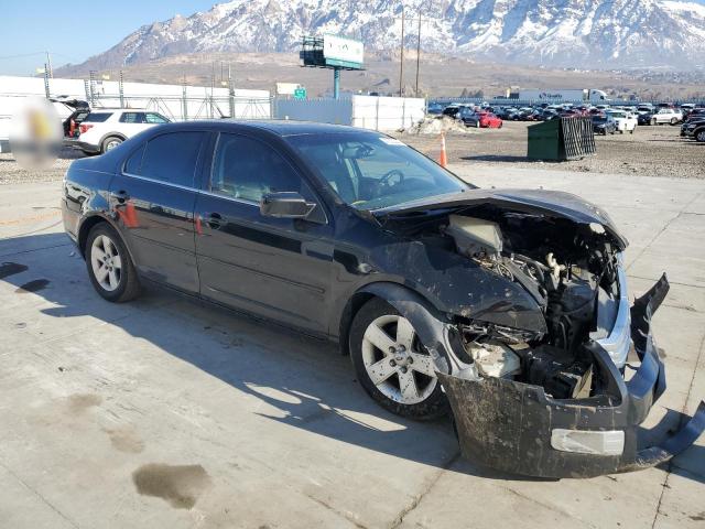 3FAHP08168R250212 - 2008 FORD FUSION SEL BLACK photo 4