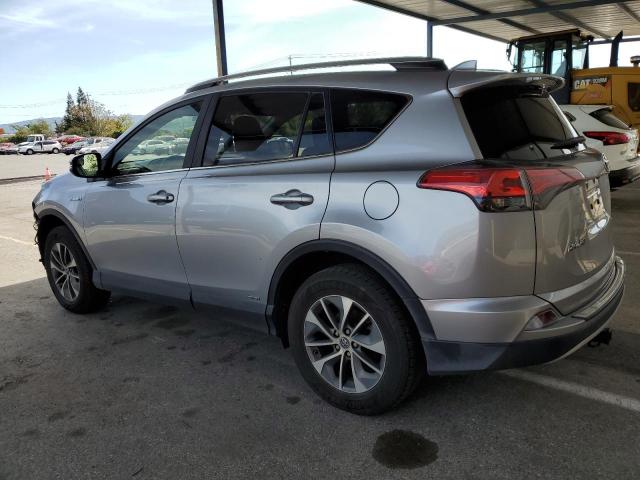 JTMRJREVXJD188131 - 2018 TOYOTA RAV4 HV LE SILVER photo 2