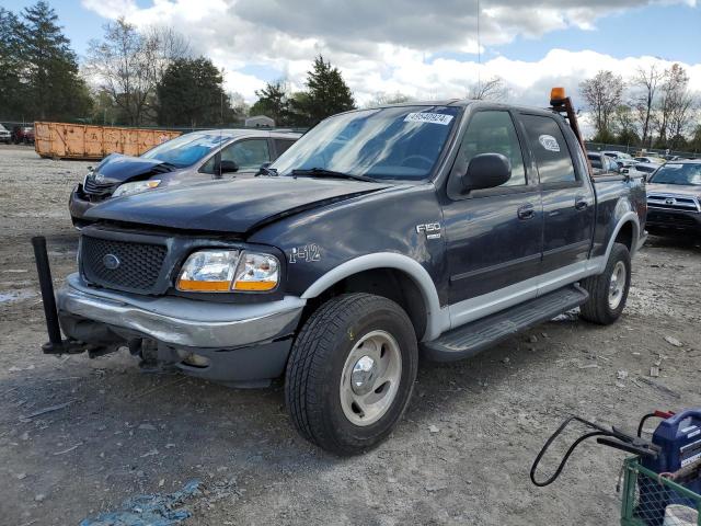 1FTRW08L71KB66087 - 2001 FORD F150 SUPERCREW BLUE photo 1