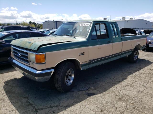 1FTEX15N3LKA35555 - 1990 FORD F150 GREEN photo 1